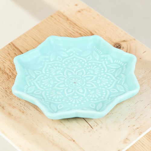 Blue Mandala Incense Stick Holder, empty ceramic dish with mandala textured design on a wooden surface.